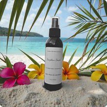 Load image into Gallery viewer, Spray bottle labeled 'Brazilian Beach' on a sandy beach with flowers and palm leaves.