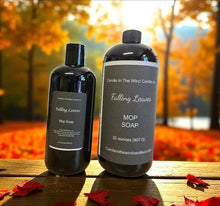 Load image into Gallery viewer, Two bottles of 'Falling Leaves' MOP Soap on a wooden surface with a blurred autumn background.