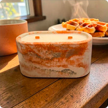 Load image into Gallery viewer, Concrete container on a wooden table, waffles in the background.